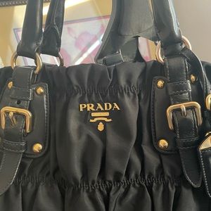 Womens Designer Prada Nylon Ruched Tote Bag. Not two-way, there’s no extra strap